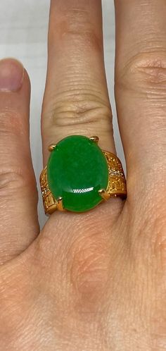 "Vintage Lucky Green Nephrite Jade ring Large green nephrite jade  Ornate gold finished White bronze Vintage ring, does not tarnish, NOT sterling Size 6.5,or  7 ONLY  My jeweler can custom re size for a $20 fee  All rings are shipped free in the US in a nice gift box.   Check out our over a THOUSAND great reviews Engraving is $4 per letter and is not always perfect depending on the piece. It can take a few days if the jeweler is busy. This is payable to Paypal Judithsltd@gmail.com This is \"fun Green Signet Ring With Oval Cabochon Gemstone, Green Oval Cabochon Signet Ring, Green Oval Cabochon Gemstone Signet Ring, Jade And Gold Jewelry, Green Oval Cabochon Signet Ring For Gift, Green Oval Cabochon Signet Ring As Gift, Gold Oval Chrysoprase Emerald Ring, Gold Jade Cabochon Rings, Gold Rings With Jade Cabochon