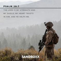 a soldier standing on top of a grass covered field next to trees with the bible verse