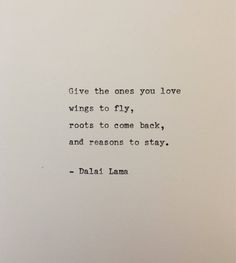 an old typewriter with the words give the ones you love wings to fly, roots to come back and reason to stay