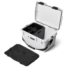 an open white and black cooler with its lid opened