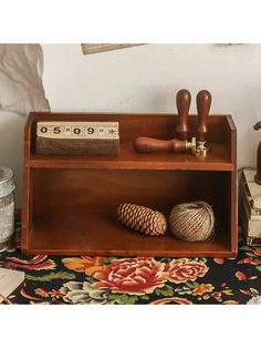 a wooden shelf with various items on it