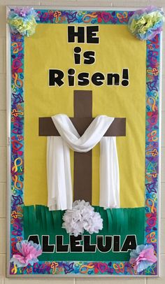 a bulletin board with the words he is risen written on it