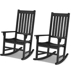 two black rocking chairs sitting next to each other on a white background with no one in it