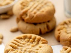 cookies with peanut butter frosting are sitting on a table