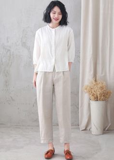 "Soft and comfy women linen blouse for summer, casual style blouse, loose fit size. Details: * linen shirt * rolled collar * 3/4 length sleeves * front button closure * loose and comfortable * causal women style * The model is 170cm (5′7″) tall with a 84cm (33\") bust, 66cm (26\") waist. She is wearing in size XS. Choose CUSTOM Order if you * Can't find your size in our size Chart * Your Height is not Between 5'1\" - 5\"9\" * Your weight is over 80kg SIZE GUIDE Size vary between Brand and Countr Spring Flax Relaxed Fit Blouse, Casual Ramie Tops For Daywear, Neutral Linen Shirt For Spring, Spring Neutral Linen Shirt, Spring Flax Ramie Blouse, Spring Flax Colored Ramie Blouse, Spring Flax-colored Ramie Blouse, Spring Linen Button-up Blouse, Flax Blouse For Spring Workwear