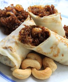 some food is laying on a plate with nuts