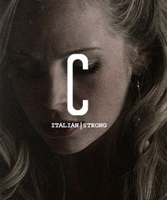 a woman with long blonde hair and the letter c