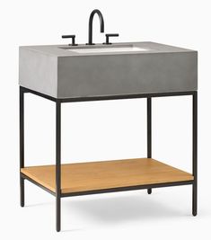 a sink with a wooden shelf underneath it and a faucet on the side