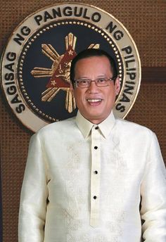 a man standing in front of a sign with the words ngg paengulo ng biriyans on it