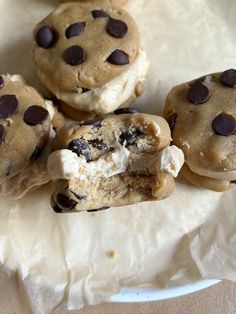 chocolate chip cookies and ice cream on top of parchment paper