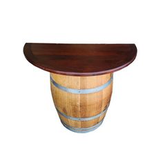 a wooden barrel table with a curved top on an isolated white background for use as a centerpiece