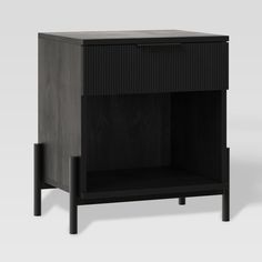 a black cabinet with two drawers on one side and an open drawer on the other