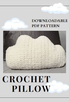 the crochet pillow pattern is shown in white and has clouds on it, as well