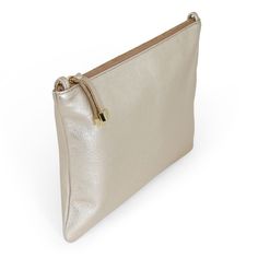 The largest of our organizational pieces, the Vale Pouch in Platinum is ideal for dropping in carry-ons and our larger handbags. A roomy size, we recommend it for an organizing piece or carry it on its own. Two interior slip pockets will ensure your essentials stay in place. The versatility of this classic zip pouch also makes it an ideal clutch for an evening out or add a strap to go hands-free. Chic Bags With Zipper Pouch For On-the-go, Elegant Zipper Pouch Bag For On-the-go, Versatile Crossbody Pouch With Zipper Pocket, Luxury Everyday Shoulder Bag With Zipper Pouch, Minimalist Rectangular Pouch With Zipper, Minimalist Rectangular Zipper Pouch, Versatile Zipper Clutch Pouch, Versatile Zipper Pouch Clutch, Versatile Clutch With Zipper