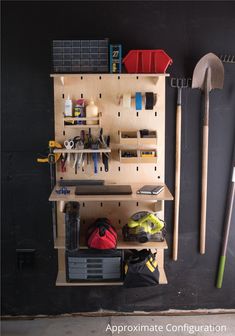 a tool rack with tools hanging on the wall