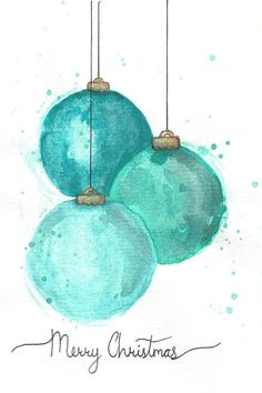 three blue ornaments hanging from strings with merry christmas written on the bottom and below them