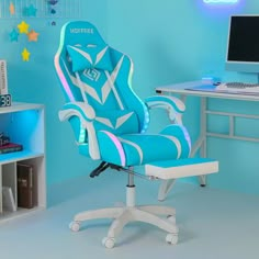 a blue office chair sitting in front of a computer desk