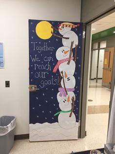 a door decorated with snowmen and the words together we can reach our goals on it