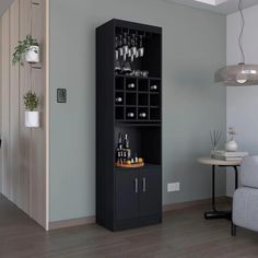 a tall black cabinet with wine glasses on it