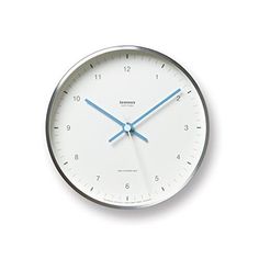 a white clock with blue hands and numbers on the face is shown against a white background