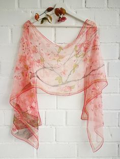 Luxury Hand painted Silk Chiffon scarf with flowering Cherry Tree branch in Warm Pink background. Lots of white and light pink cherry blossoms and little dark pink buds flowering in a spring time. Several olive green leaves and wind blown petals... Some accents in gold. All this beauty is framed with and double olive green and darker pink boarding. Very romantic, sweet, soft and cozy. ---------------------------------------------------------------------------------------------------------------- Pink Shawl Scarf For Spring, Pink Shawl Scarves For Spring, Pink Dupatta For Spring Wedding, Pink Wedding Dupatta For Spring, Pink Floral Print Shawl Scarf, Spring Floral Print Pink Dupatta, Pink Silk Shawl For Spring, Summer Pink Floral Print Dupatta, Pink Feminine Floral Print Scarves