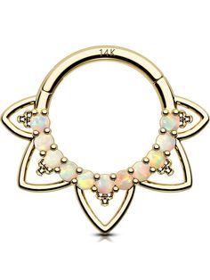 an open gold nose ring with opal stones on the end and a circular design in the middle