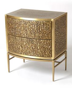 a golden chest with two drawers on it