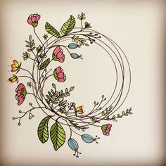 a drawing of flowers and leaves in a circle