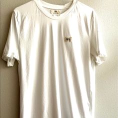 Zara White T-Shirt Short Sleeve 100% Cotton Nwot Zara Logo On The Left Side Everyday Tan Cotton T-shirt, Casual Tan Cotton T-shirt, Zara White Graphic Tee, Zara Graphic Tee Cotton T-shirt, Zara Cotton Graphic Tee, Zara Casual T-shirt With Relaxed Fit, Zara Casual Crew Neck T-shirt, Zara Crew Neck T-shirt Relaxed Fit, Basic Zara Cotton Top