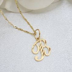 Dainty Solid 14k Yellow Gold Cursive B Initial Necklace. Perfect For A Minimalist Look. Unique, Shiny, And Modern. 14k Gold Will Not Tarnish Or Rust. Materials: 14k Gold Lenght: 18 Inches Chain Thickness: 0.7mm Total Weight: 1.3 Grams 14k Stamped Brand New Fast Shipping Perfect For Her Follow Us For More Fine 14k Gold Jewelry For Fair Prices. Dm Me With All Your Questions, And I Will Be Happy To Help You B Initial Necklace, Cursive B, Blush Necklace, B Initial, Beaded Boho Necklace, Tassel Necklace Boho, Handmade Pendant Necklace, Silver Necklace Set, Crystal Heart Pendant