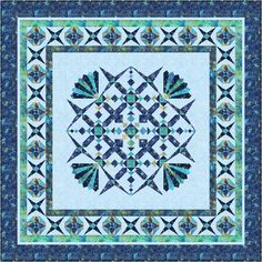 a blue and white quilt with an intricate design