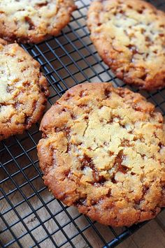 several cookies cooling on a wire rack