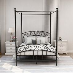 a bedroom with a bed, dressers and two night stands