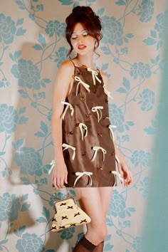 Brandy Brown Mini Dress with Bow Embellishments- Made to Order – Natalie & Alanna Bows In Fashion, Lovers And Friends Outfits, Ribbon Dress Fashion, Retro Catalogue, Mini Dresses Aesthetic, Vintage Outfits Dress, Bows Outfit, 60s Inspired Fashion, Retro Chic Fashion