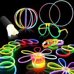 The Small Glow Party Pack Assorted Colors and Glow Accessories. Glow Products have remained one of the hottest products on the light-up market for years and they're still going strong. They contain a non-toxic, glow-in-the-dark chemical that illuminates once activated. To activate, simply bend the stick until you hear it crack. This will release the chemical from within the glow bracelet and it will immediately start to Glow. They will last approximately 6 - 8 hours once activated. These can be Glow Stick Crafts, Glow Stick Jars, Glow Party Decorations, Disco Rave, Glow Stick Wedding, Glowing Glasses, Glow Stick Party, Glow Birthday Party, Glowing Flowers