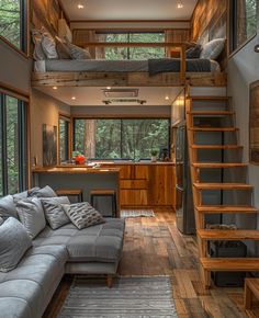 a living room filled with lots of furniture next to a wooden staircase leading up to a loft bed