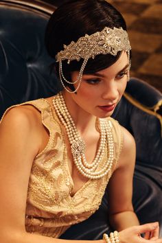 Roar back 100 years to unprecedented golden 20s with this headband, which perfectly create an elegant and sophisticated Gatsby style. Features: Sparkling rhinestones Art deco style Adjustable elastic band Intricately arranged rhinestone pattern Elegant Silver Beaded Headpiece, Elegant Crystal Headpieces For Weddings, Gold Beaded Wedding Headpieces, Gold Embellished Headpieces For Wedding, Elegant Silver Headpiece With Rhinestones, Evening Gatsby Style Gold Jewelry, Gatsby Style Gold Evening Jewelry, Glamorous Crystal Embellished Headband, Evening Gatsby Gold Jewelry