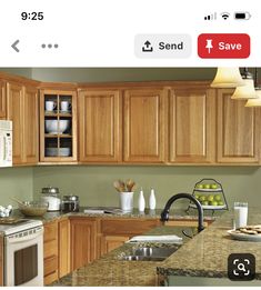 a kitchen with wooden cabinets and granite counter tops