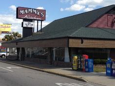 the exterior of a restaurant called mammy's as seen from across the street