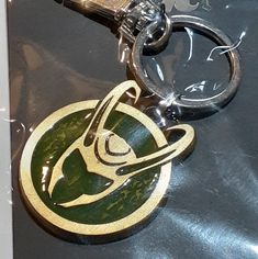 a keychain with a star trek emblem on it