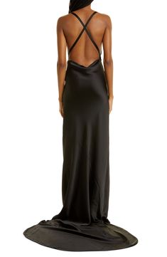 Command attention in this smooth satin cowl-neck gown featuring cross-back straps and a low back that pools into a romantic train. Cowl neck Cross-back straps 100% polyester Machine wash, line dry Imported Black Bridal Dresses, Cross Front Dress, Backless Gown, Cape Gown, Black Cape, Black Bridal, Satin Gown, Dress Home, Norma Kamali