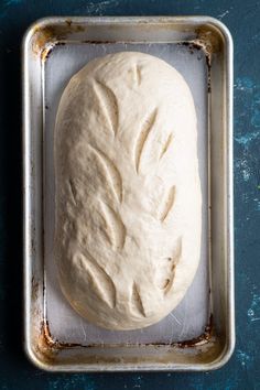 a loaf of bread sitting on top of a pan