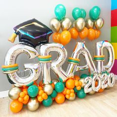 an image of graduation balloons in the shape of letters