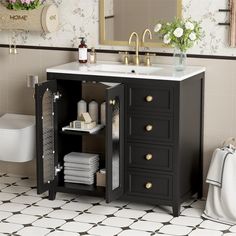 a bathroom with a sink, mirror and cabinets in it's centerpieces