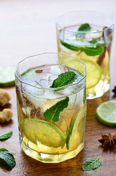 two glasses filled with lemonade and mint tea