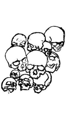 a bunch of skulls with faces drawn in black and white