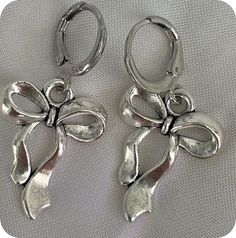 Cute Silver Earrings With Bow, Cute Sterling Silver Hoop Earrings Gift, Silver Metal Earrings With Bow, Silver Butterfly Knot Earrings As Gift, Silver Butterfly Knot Earrings For Gift, Cute Silver Hoop Earrings, Silver Bow, Cute Bows, Etsy Earrings