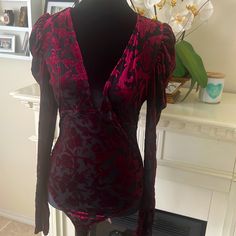 Free People Intimately Gorgeous Crunched Velvet Thing Body Suit Nwt Flirty Fitted V-neck Blouse, Fitted Ruched Red Blouse, Fitted Red Blouse For Night Out, Bell Sleeve Bodysuit, Free People Jumpsuit, Corset Bodysuit, Free People Bodysuit, Black Lace Bodysuit, Floral Bodysuit