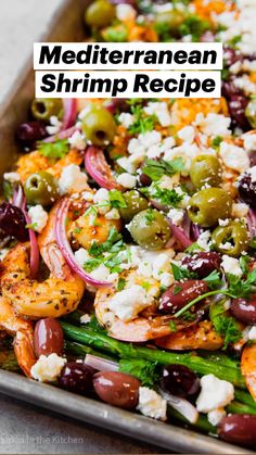 sheet pan mediterranean shrimp salad with olives, feta cheese and red onions on top