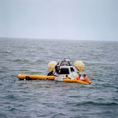 an inflatable boat floating on top of the ocean